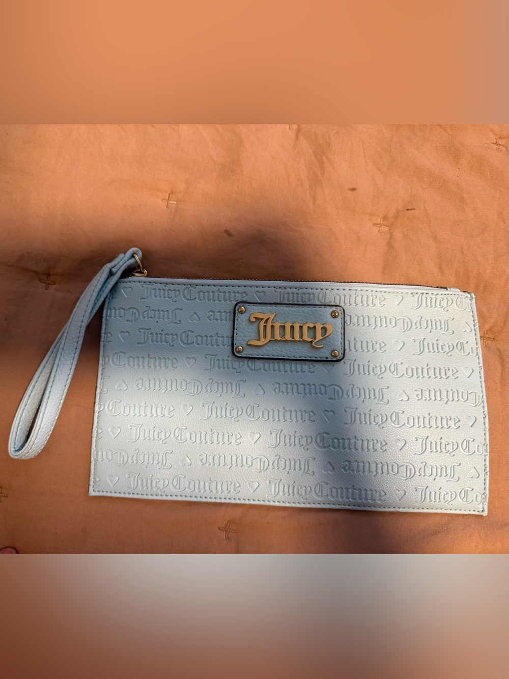 Juicy Couture Pale Blue Embossed Wristlet with Gold Plaque